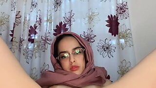 arab with hijab on stretches using anal toys 3